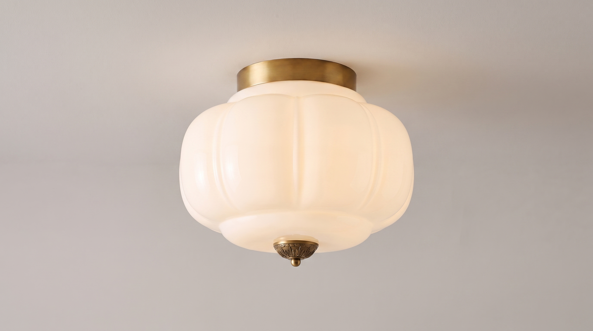 Eloise milk glass fluted semi flush mount ceiling light switched on, glowing evenly with no hot spot