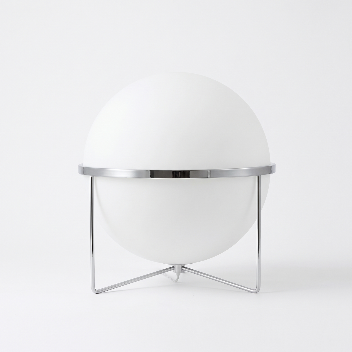 Mira opal acrylic globe accent lamp on a white background