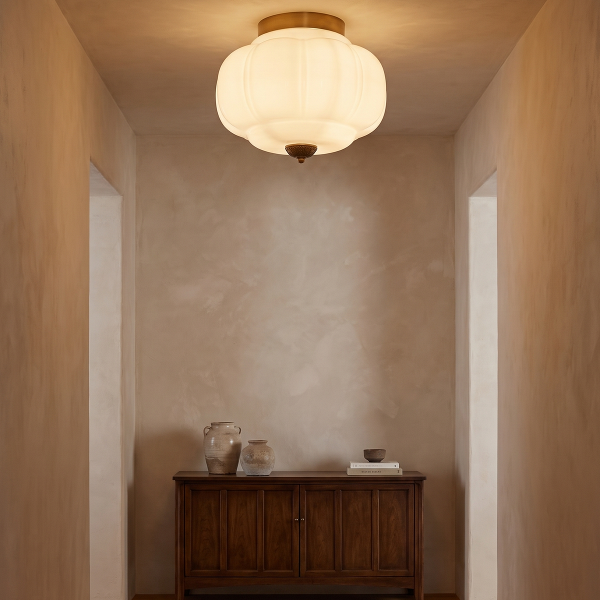 Odile ceiling light mounted in a hallway