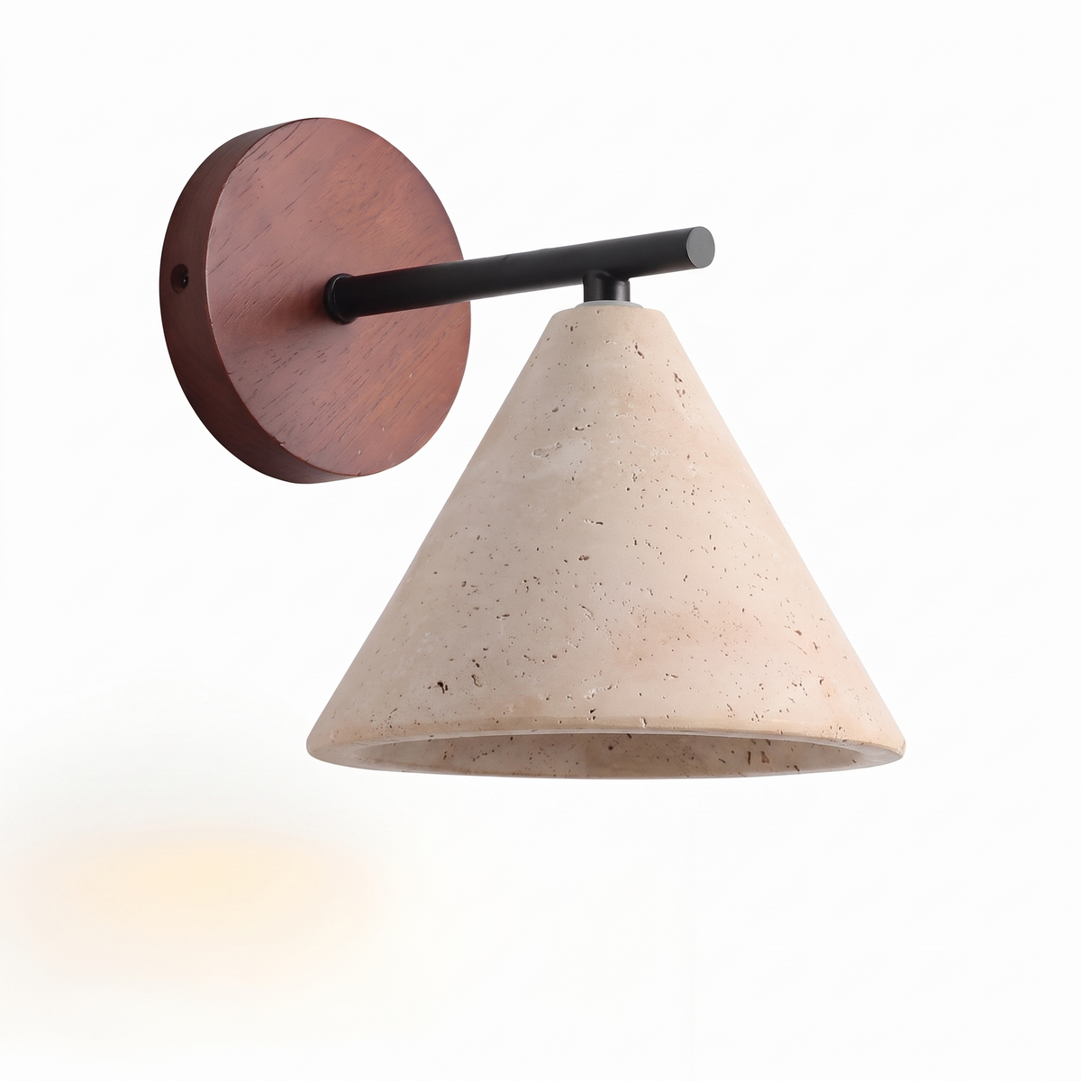 Thea travertine cone wall sconce with walnut backplate on a white background