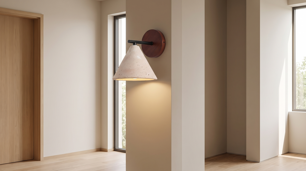 Thea sconce on a narrow wall between a doorway and a corner