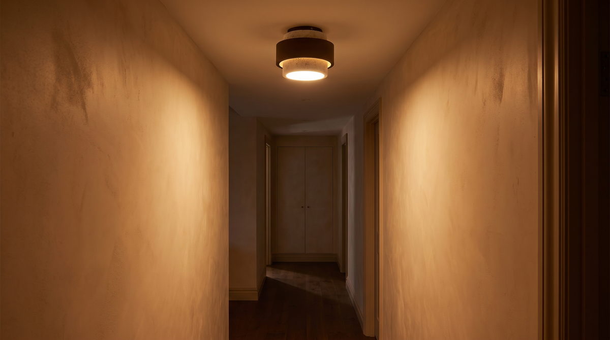 Elin ceiling light lit at night with the diffuser glowing evenly