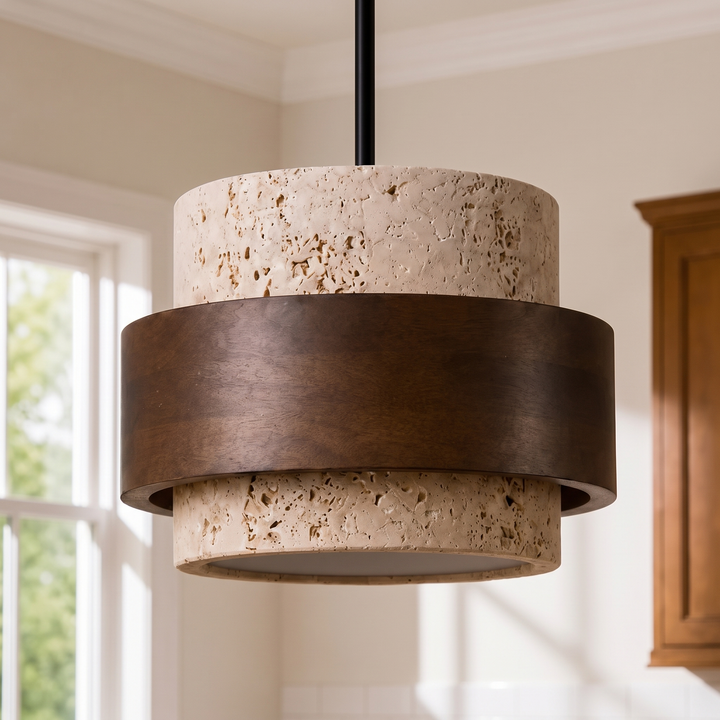 Close view of the pitted travertine and walnut banding on the Juno pendant