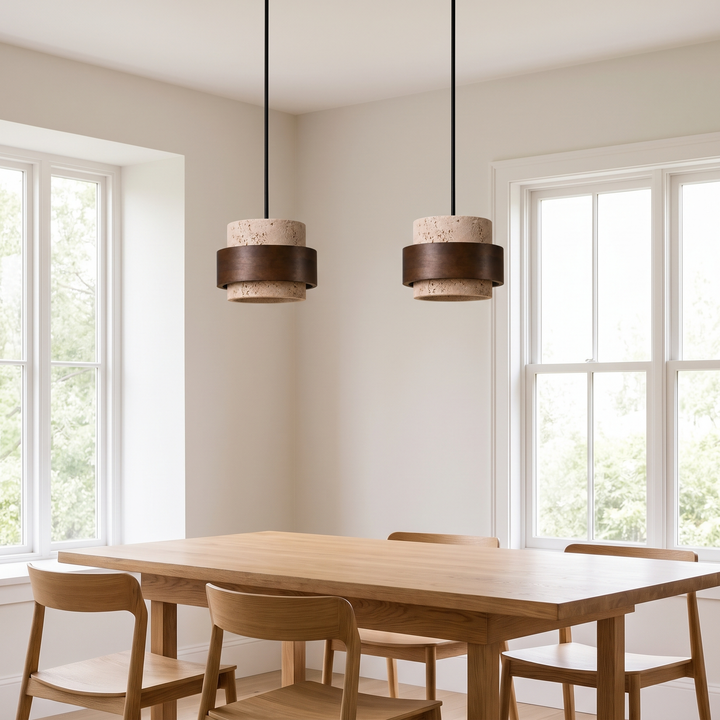 Two Juno pendant lights above an oak dining table in daylight