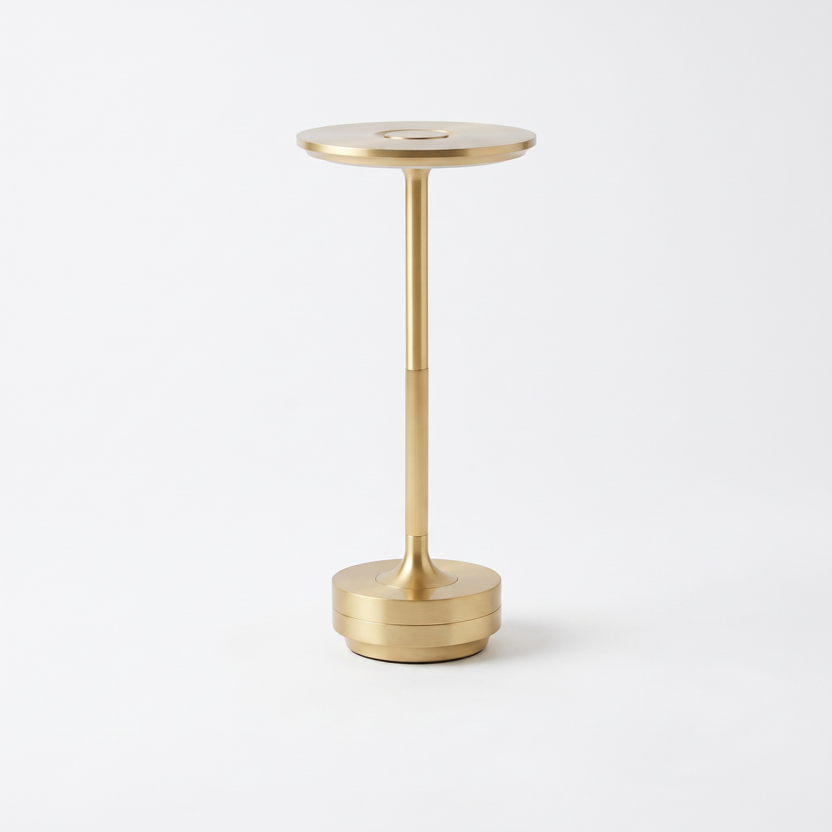 Vera gold dish table lamp on a white background