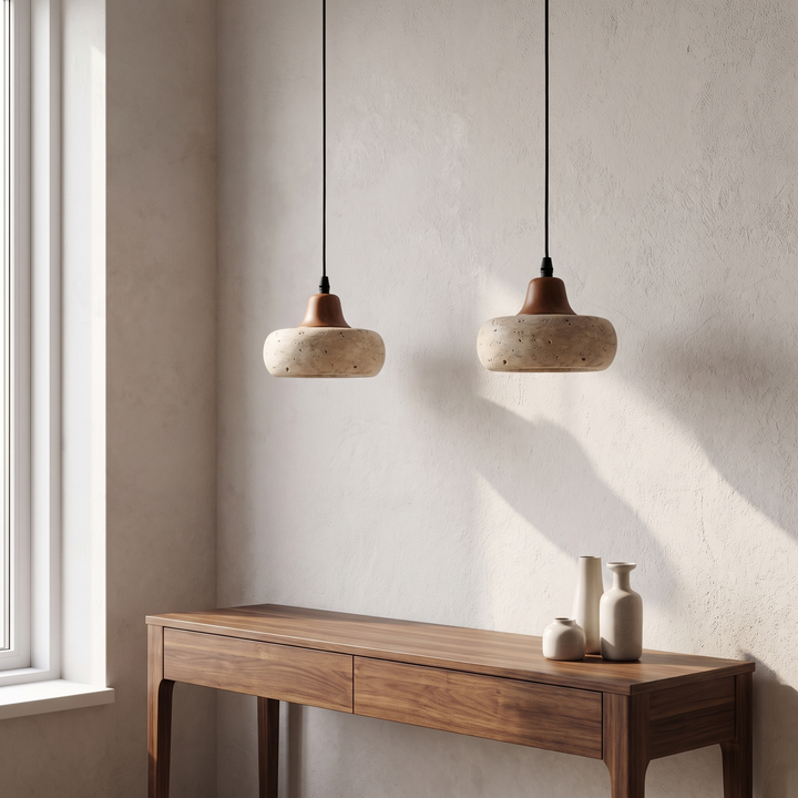 Two Freya pendants above a narrow console table