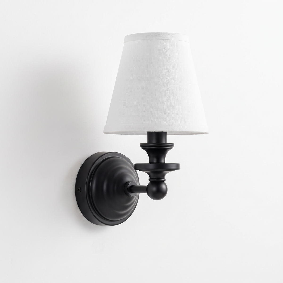 Elsie wall sconce in matte black with white linen shade