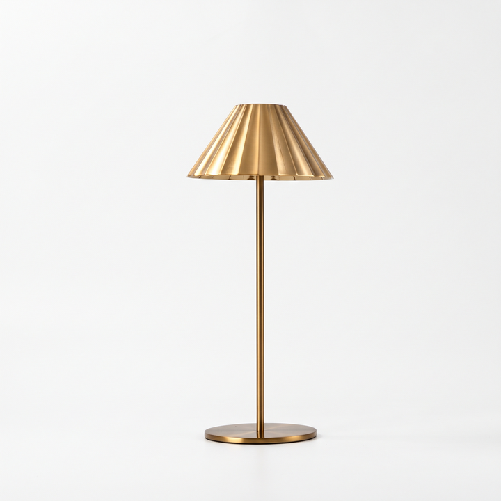 Isla brass fluted cordless table lamp on a white background