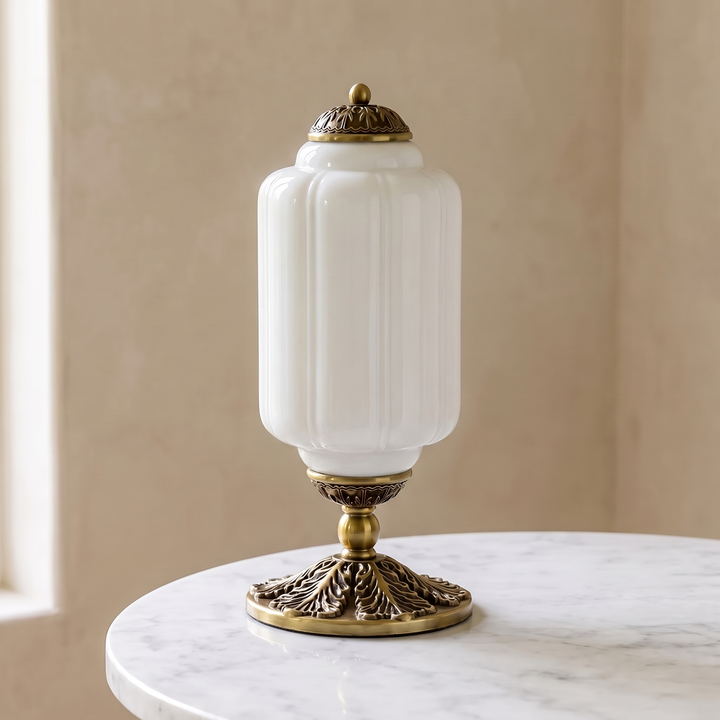Colette ribbed glass table lamp in milk white on a marble side table