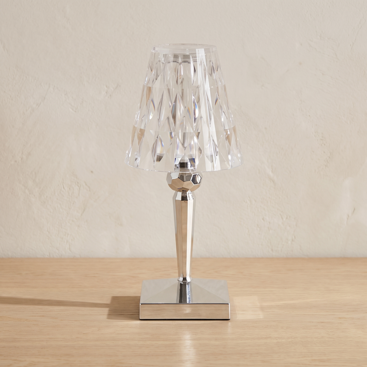 Saga faceted acrylic table lamp in silver plated