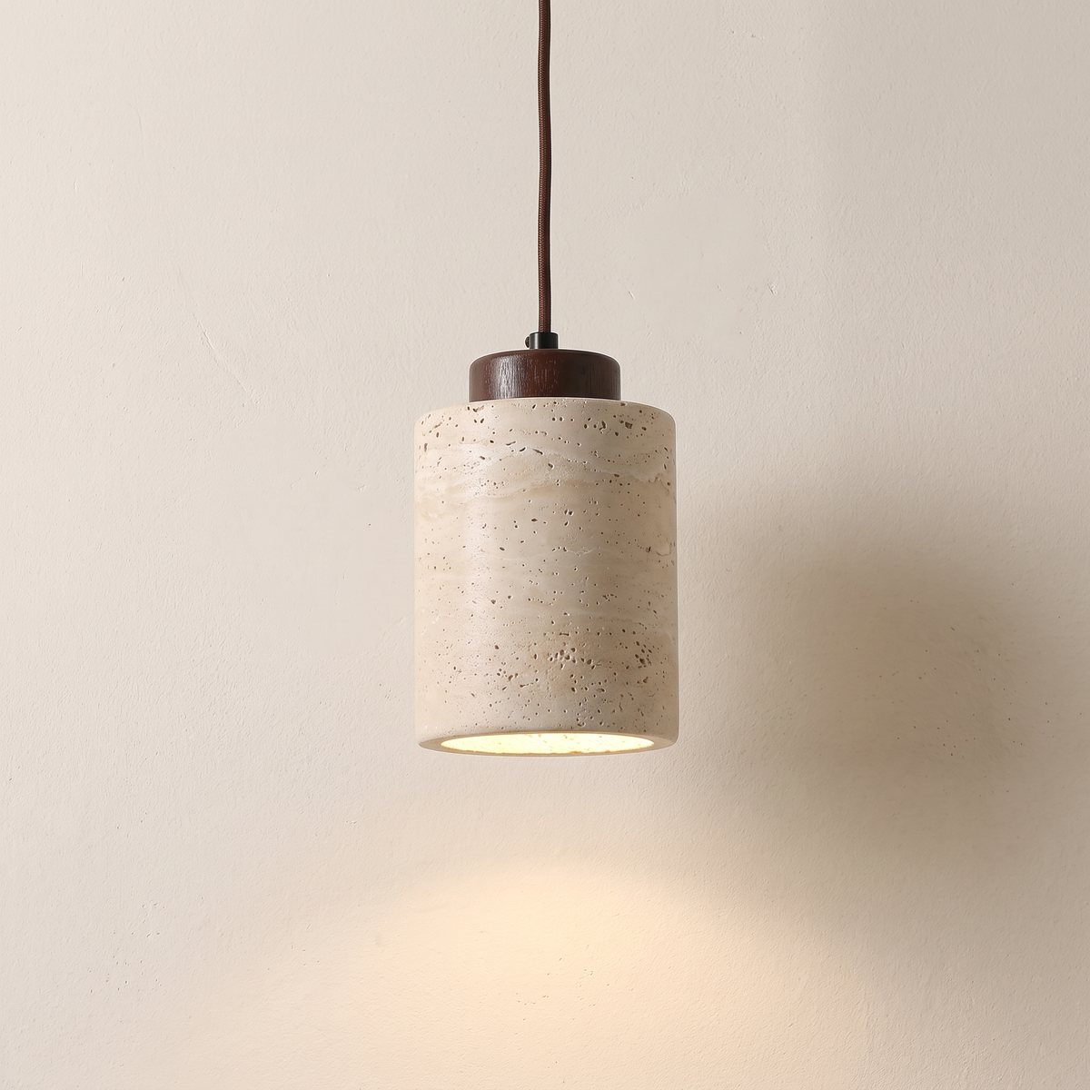Edda Cylinder travertine pendant light with a walnut cap, 4.3 inch
