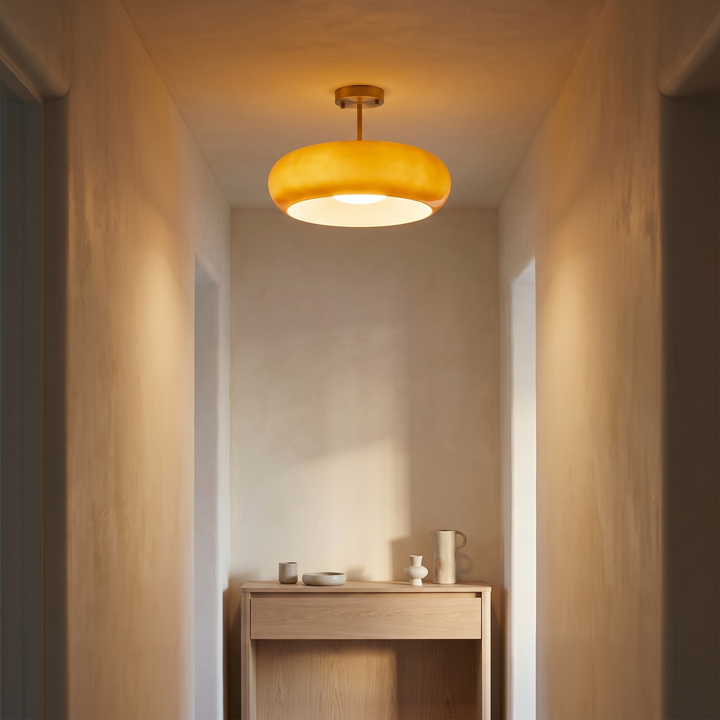 Greta amber glass semi flush ceiling light with brass fitting, 11 inch, in a hallway