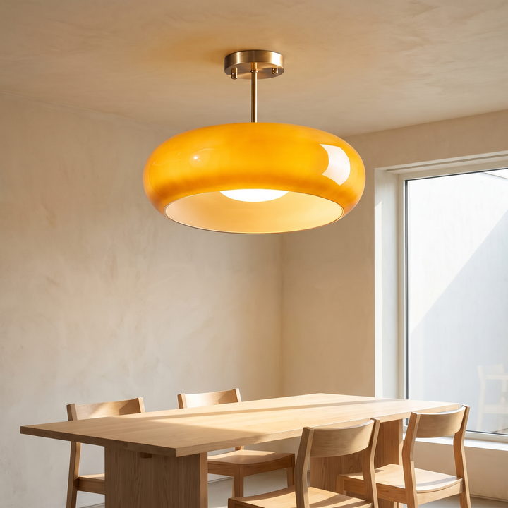 Greta amber glass semi flush ceiling light with brass fitting, 15.7 inch, over a dining table
