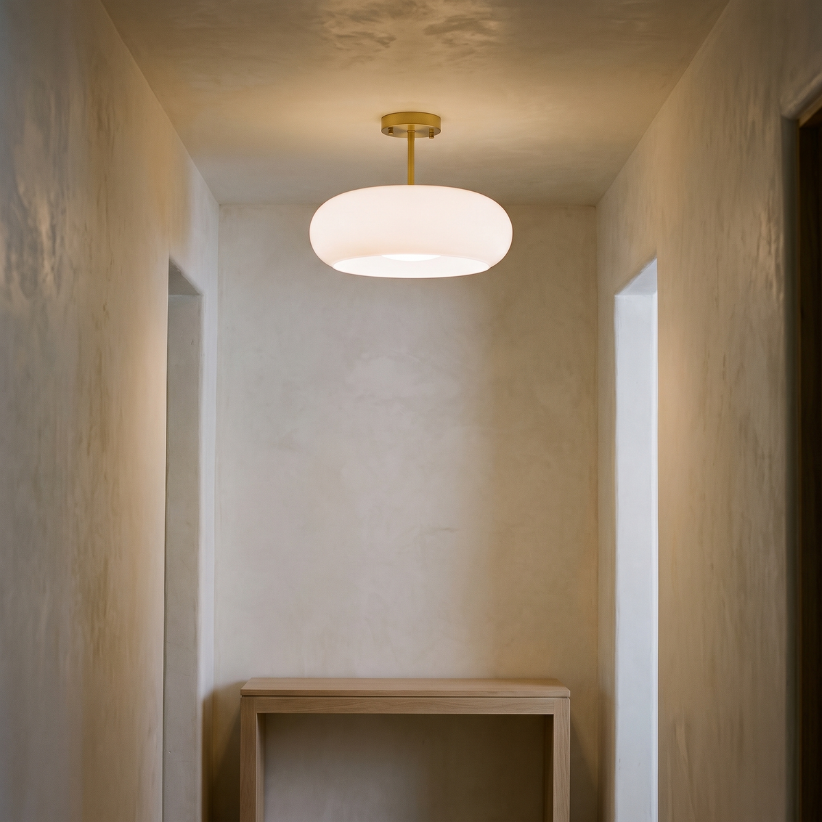Greta white glass semi flush ceiling light with brass fitting, 11 inch, in a hallway