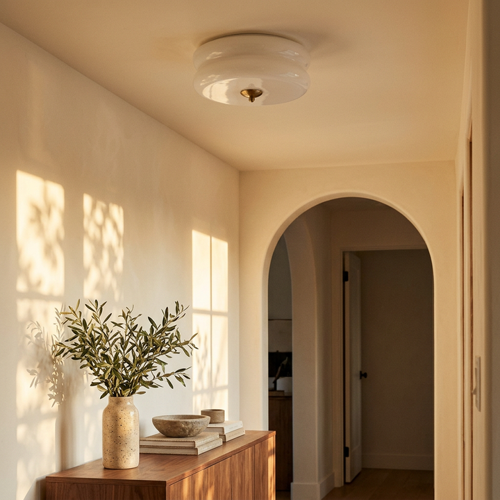 Deliona flush mount in gold with white glass