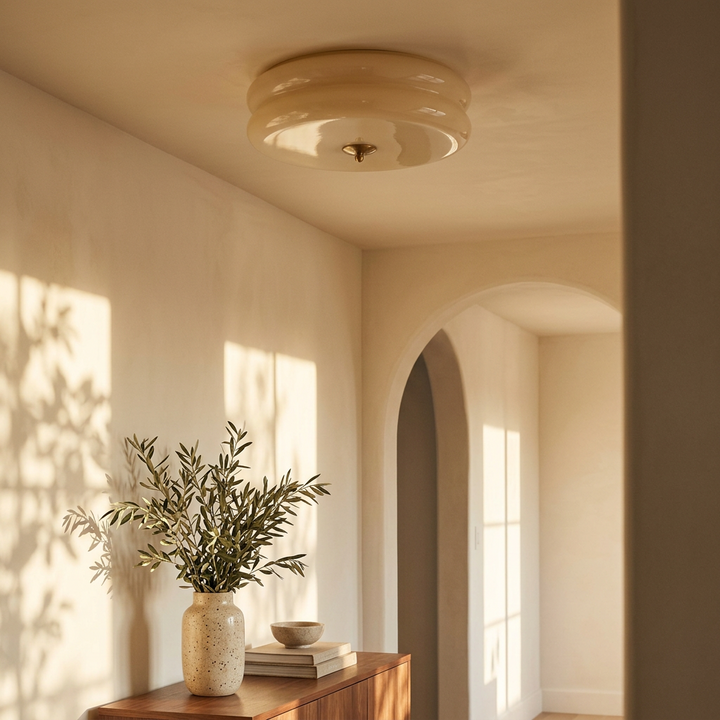 Deliona flush mount in gold with beige glass