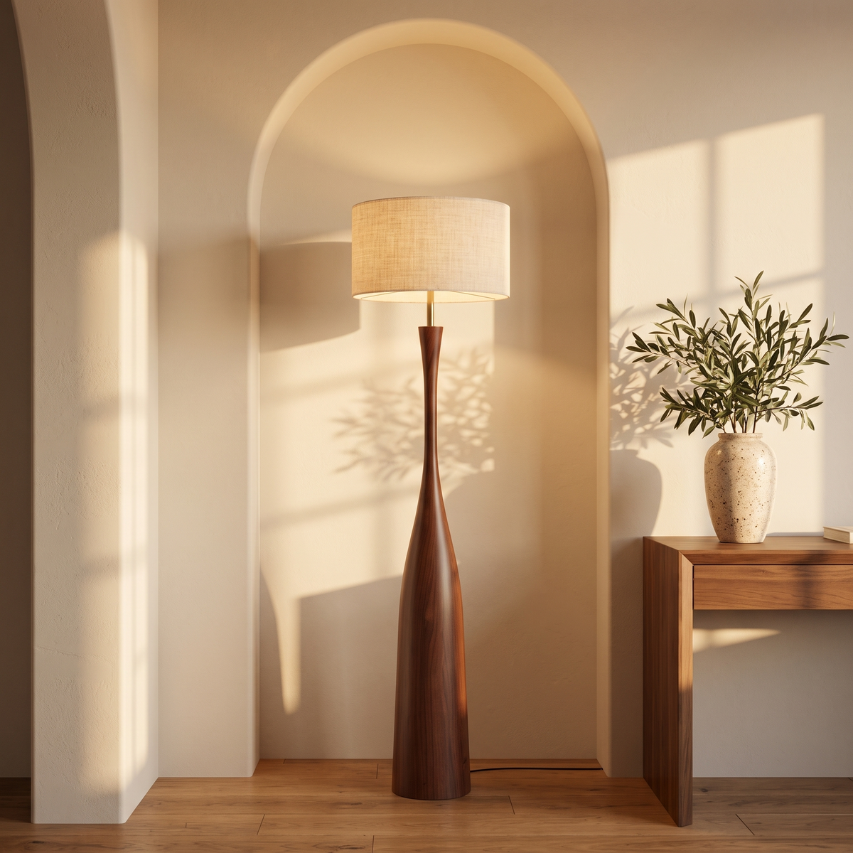 Morella floor lamp beneath an arched wall niche