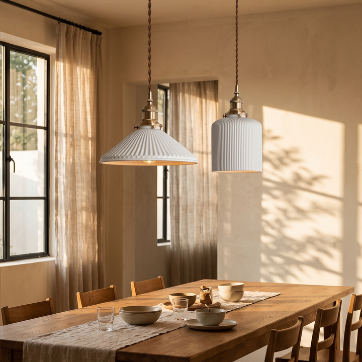 Bellora Cone pendant lights above a long oak dining table by a window