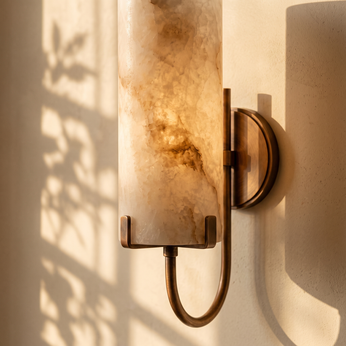 Close detail of the Tessara Loop marble shade glowing from within