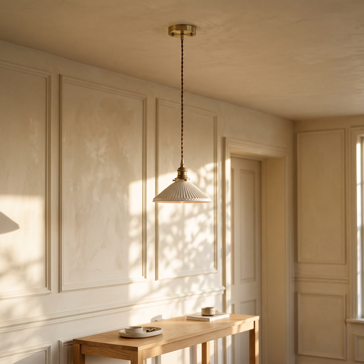 Bellora Cone pendant light in a panelled entryway