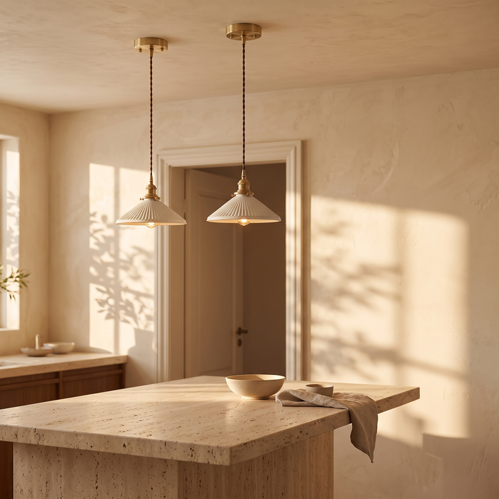 A pair of Bellora Cone pendant lights above a kitchen island