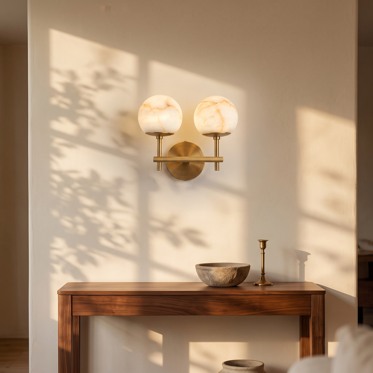 Orbella Twin with 5.1 in marble spheres in gold on leaf shadowed plaster