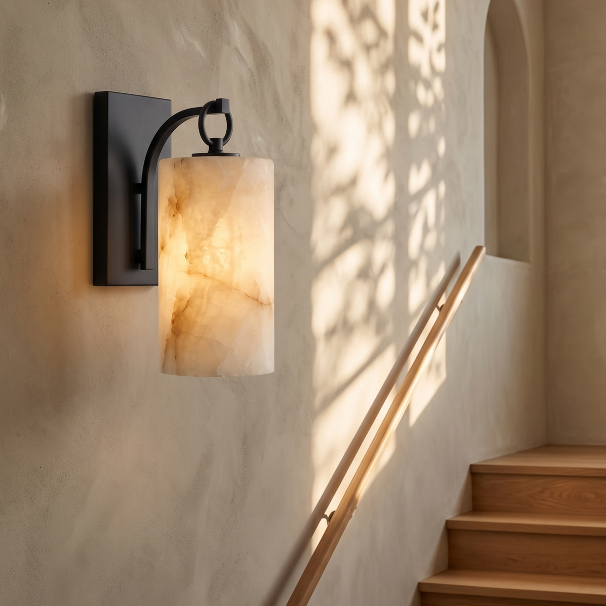 Tessara Lantern wall sconce in black in a stairwell